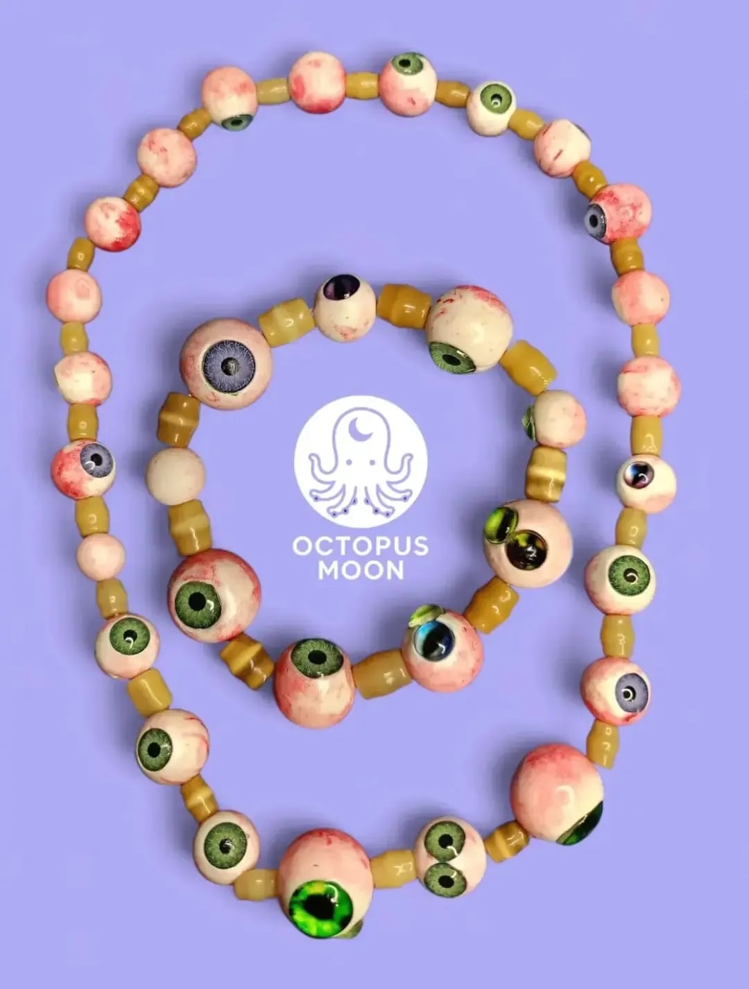 Set de collar y pulsera con cuentas de ojos